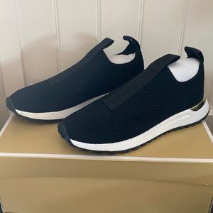 BRAND NEW! Michael Kors size 5.5 slip on mesh sneakers.
